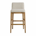 Tabouret de bar avec dossier rembourré assise rectangulaire tissu polyester beige structure en hévéa massif chêne clair repose-pieds laiton 45 cm x 54 cm x 108 cm